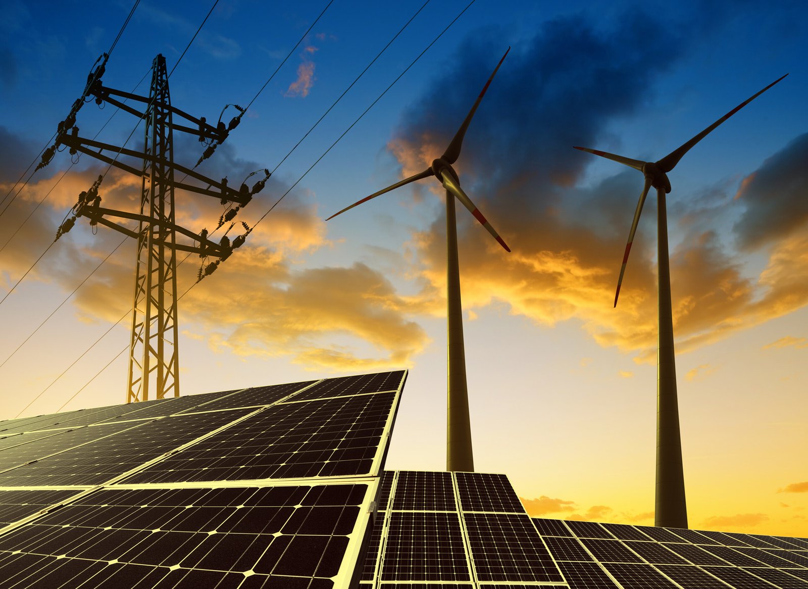 Solar,Panels,With,Wind,Turbines,And,Electricity,Pylon,At,Sunset.